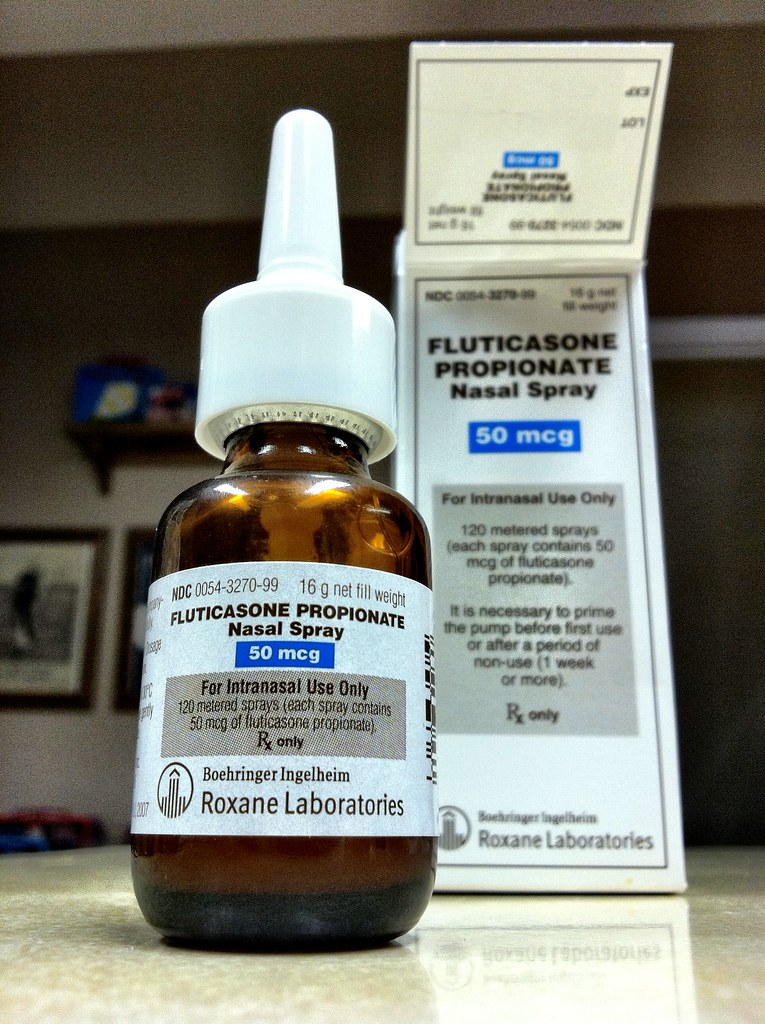 "Fluticasone Propionate Nasal Spray" by _BuBBy_ is licensed under CC BY 2.0 Photo of Fluticasone nasal spray and package