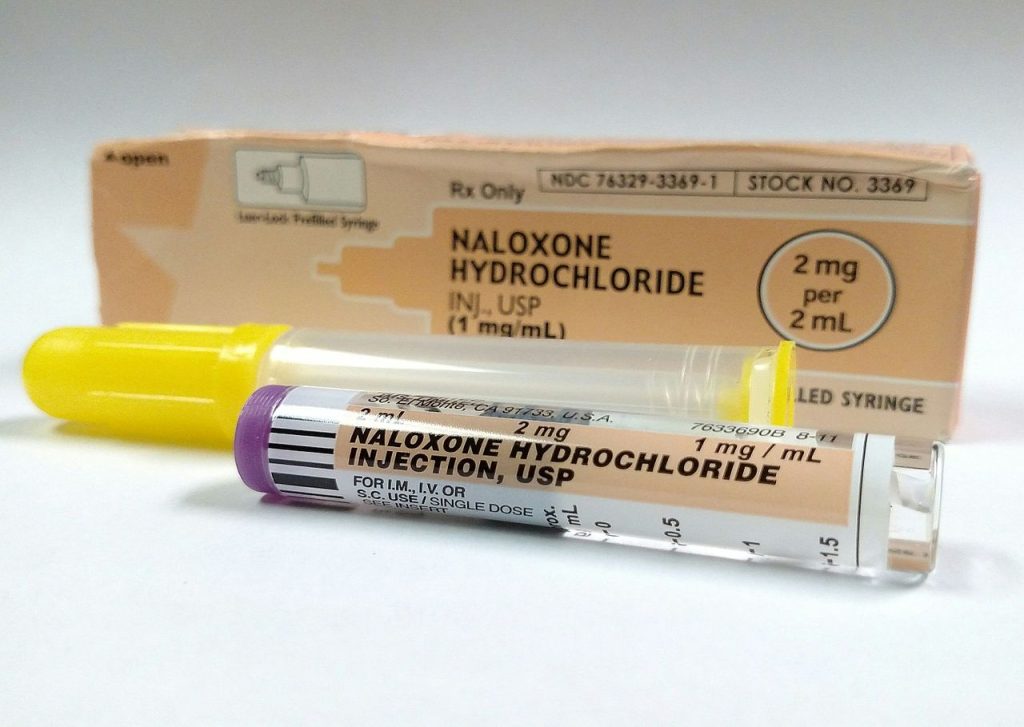 "Naloxone_2_(cropped).jpg" by Mark Oniffrey is licensed under CC BY 4.0 Photo showing prefilled syringe of Naloxone and its packaging